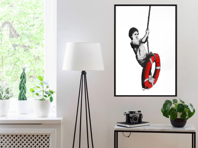 Poster Banksy: Boy on a Swing - black and white boy on a swing with a wheel 132428 additionalImage 3